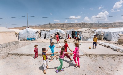 Children play in Chasmisku, Iraq