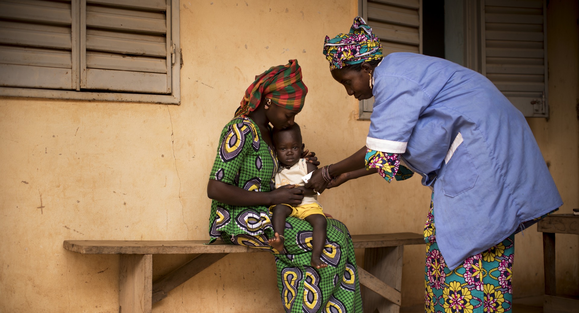 Naré Tounkara, matron of the Boudofo Community Health Center in Kita, Mali, measures a child for malnutrition.