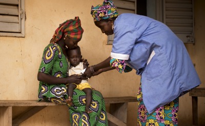 Naré Tounkara, matron of the Boudofo Community Health Center in Kita, Mali, measures a child for malnutrition.