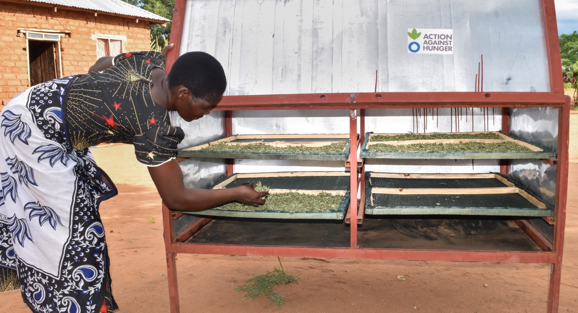 Anceran preserves her crops using solar driers.