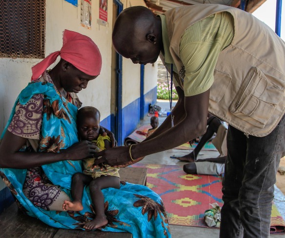 Achoc and her one year old daughter Atong receive care at an Action Against Hunger nutrition center.